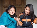 
Two sisters, one in grade 9 and the one in grade 10 who invited us to camp at her house, get ready for school in Num.
